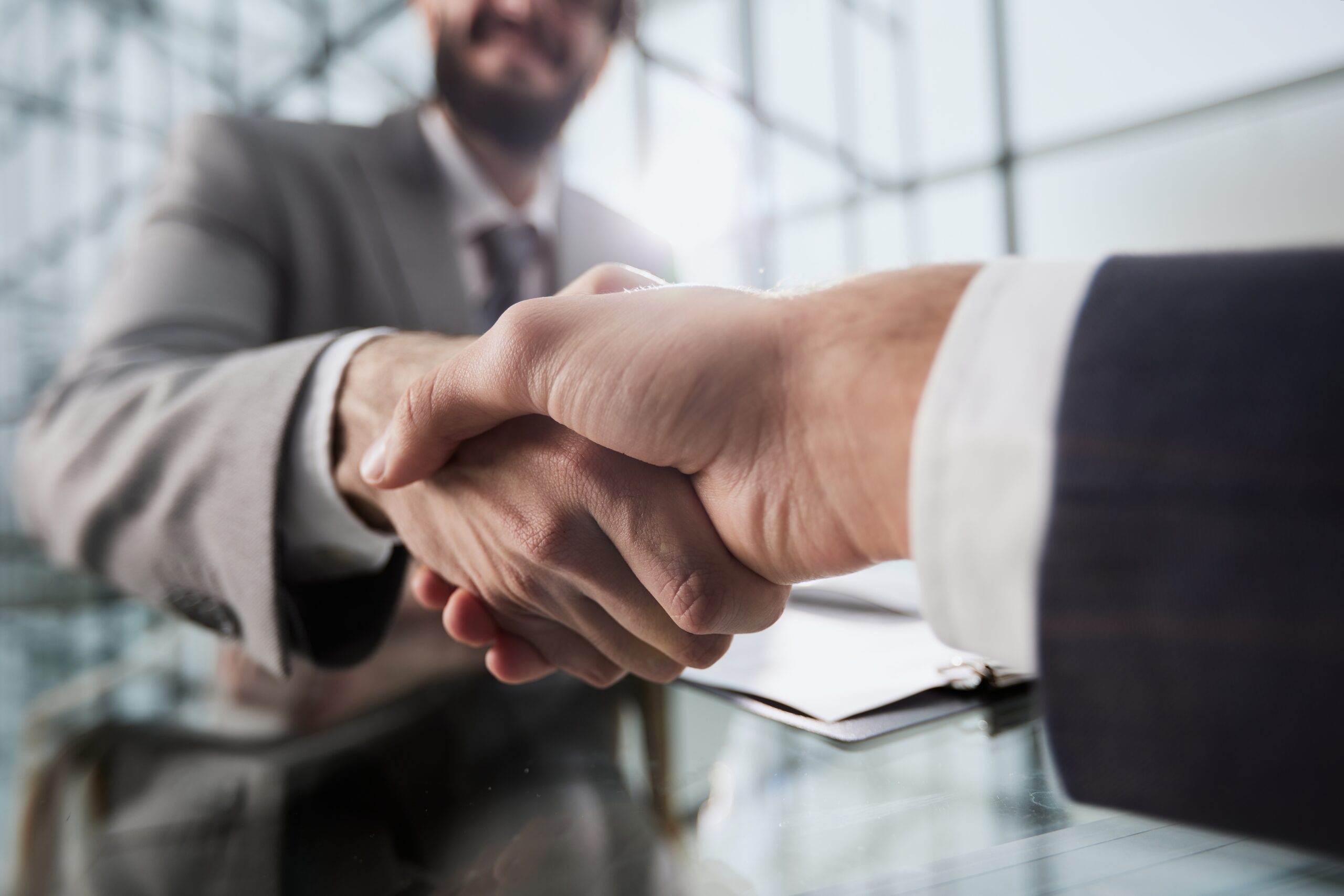 Handshake,Of,Two,Businessmen,Who,Enters,Into,The,Contract,To